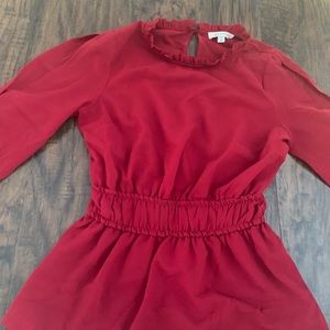 Red long sleeve shirt with slits on arms